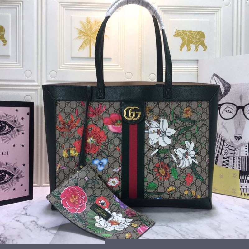 G*u*i shopping bags